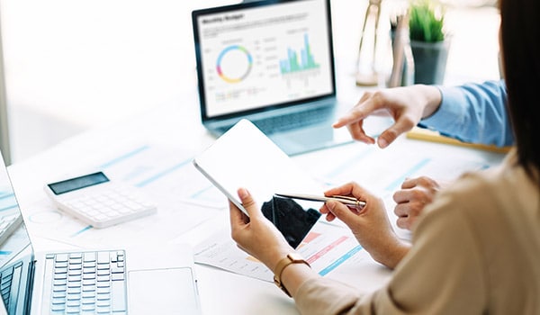 Client Success Manager reviewing customer data and analytics